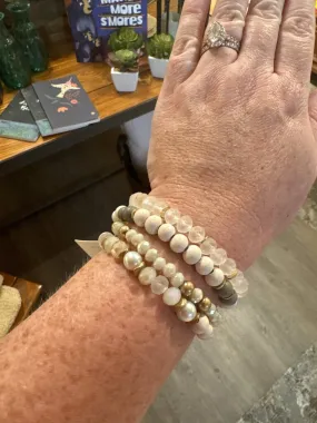 8070 Set of Four Beaded Stretch Bracelets Featuring Clear & White Beads Gold Details