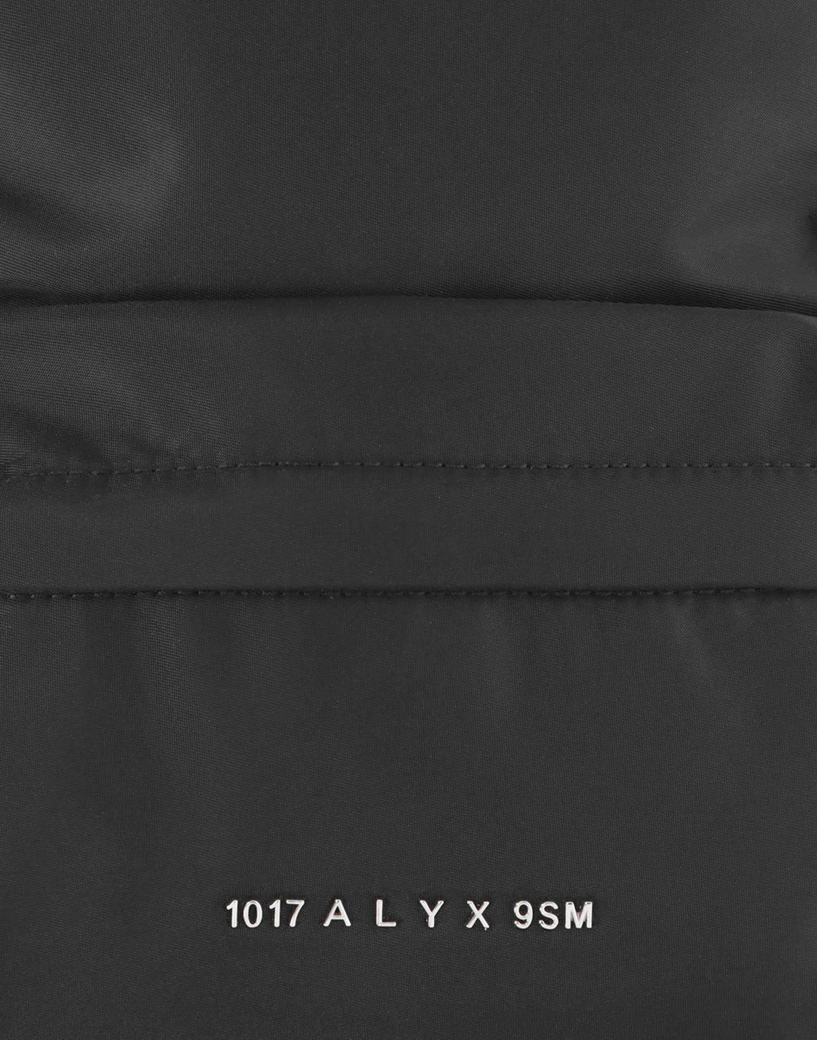 BUCKLE CROSSBODY BACKPACK